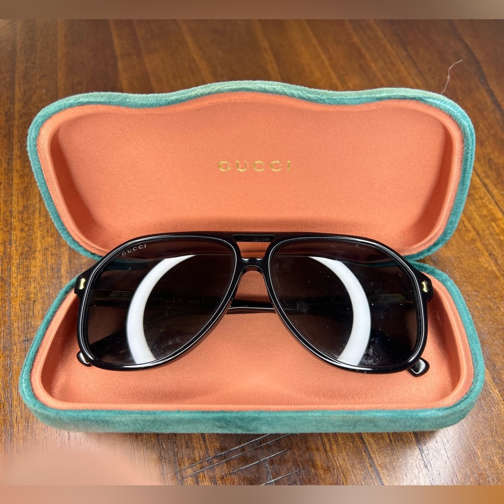 Gucci Black Pilot Sunglasses with Gold Accents